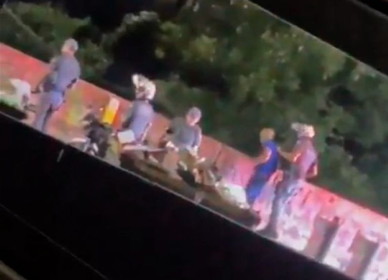 Video of military police officer throwing man off bridge sparks anger in Brazil